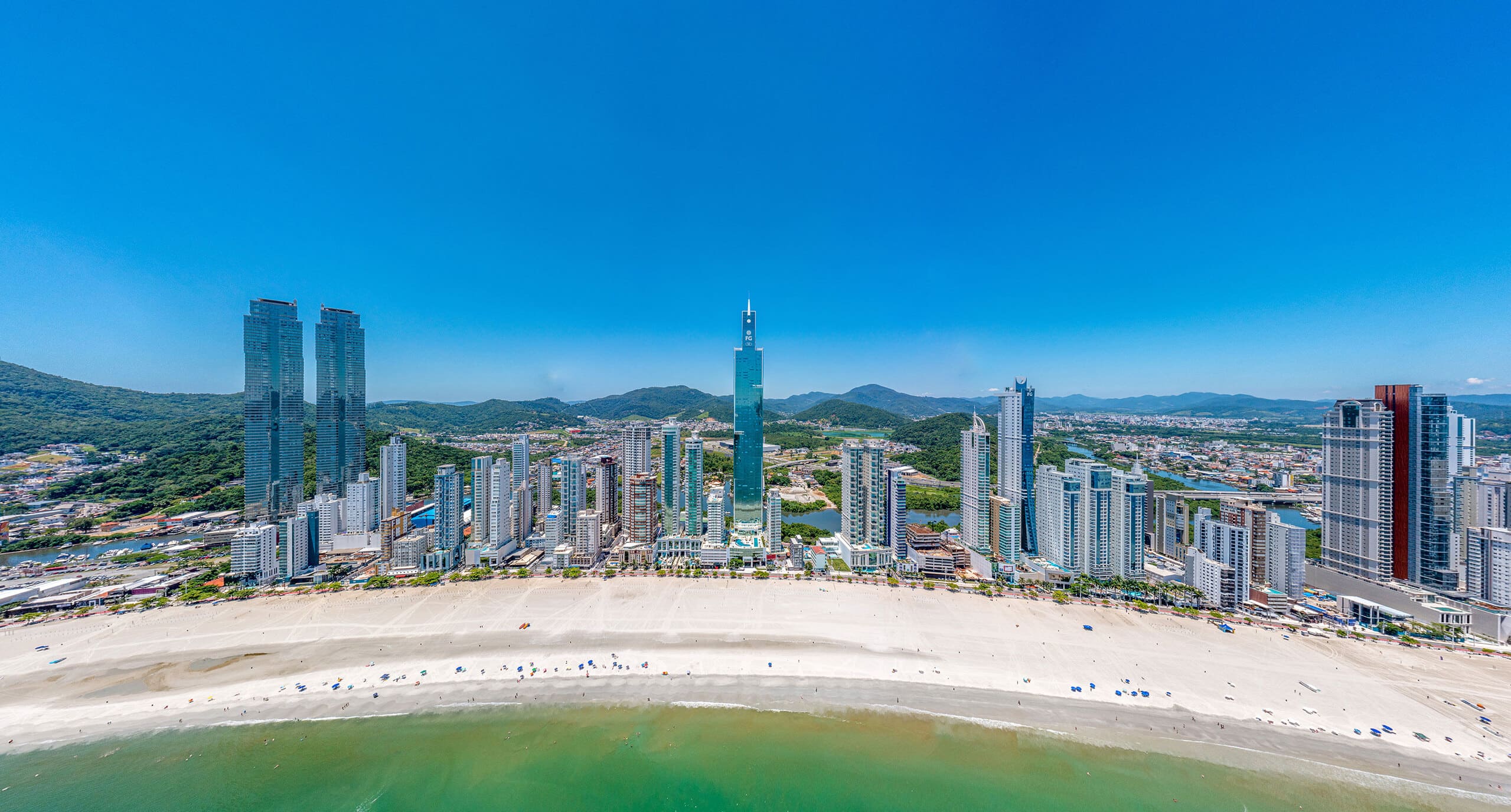 Aerial panorama of Barra Sul in Balneário Camboriú highlighting the Atlantic bay and Ilha das Cabras